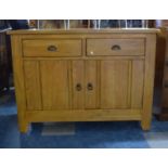 A Two Drawer Sideboard with Cupboard Base, 124cm Wide