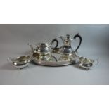 A Four Piece Silver Plated Teaservice with Two Handled Oval Pierced Galleried Tray