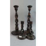 Two Pair of Edwardian Oak Barley Twist Candlesticks, 31cm and 15cm