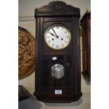 An Edwardian Oak Cased Wall Clock with Eight Day Movement, 61cm High