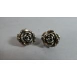 A Pair of Silver Stud Earrings in the Form of Flowers