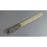 A Late 19th Century Silver Mounted Ivory Bladed Page Turner, Hallmark Rubbed. 40cms Long