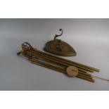 A Set of Edwardian Brass Wind Chimes Together with Wall Mounting Shield Hook