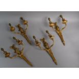A Set of Four French Gilt Decorated Two Branch Wall Lights with Bow, Ribbon and Acanthus Leaf