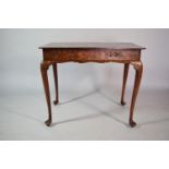 An Early 19th Century Dutch Marquetry Table with Vase and Floral Inlaid Decoration set on Cabriole