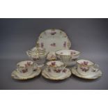 A Late 19th Century Part Tea Service Decorated with Pink Blossom and Gilt Comprising Eighteen Cups