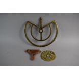 A 19th Century Brass Cog Driven Arrow Pointer, A GWR Copper Door Bracket and a Pierced Brass Disc (