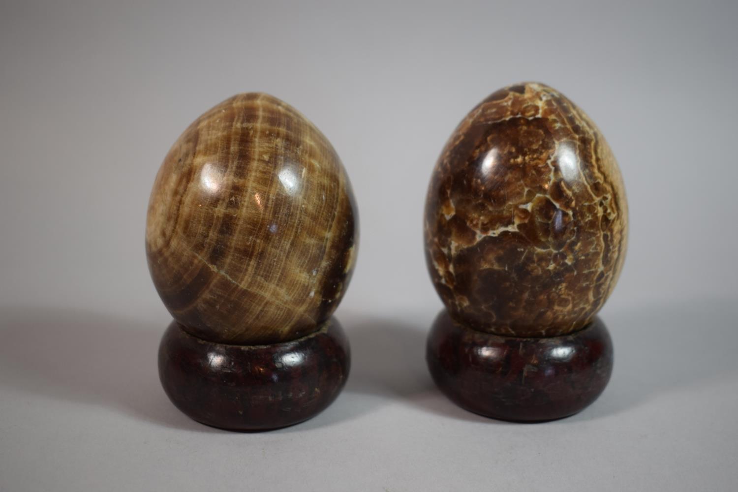 A Pair of 19th Century Hand Carved Marble Eggs on Later Stands, 9cm high