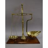 A Set of Late 19th Century Polished Brass Avery Scales and Graduated Weights on Wooden Plinth. 40cms