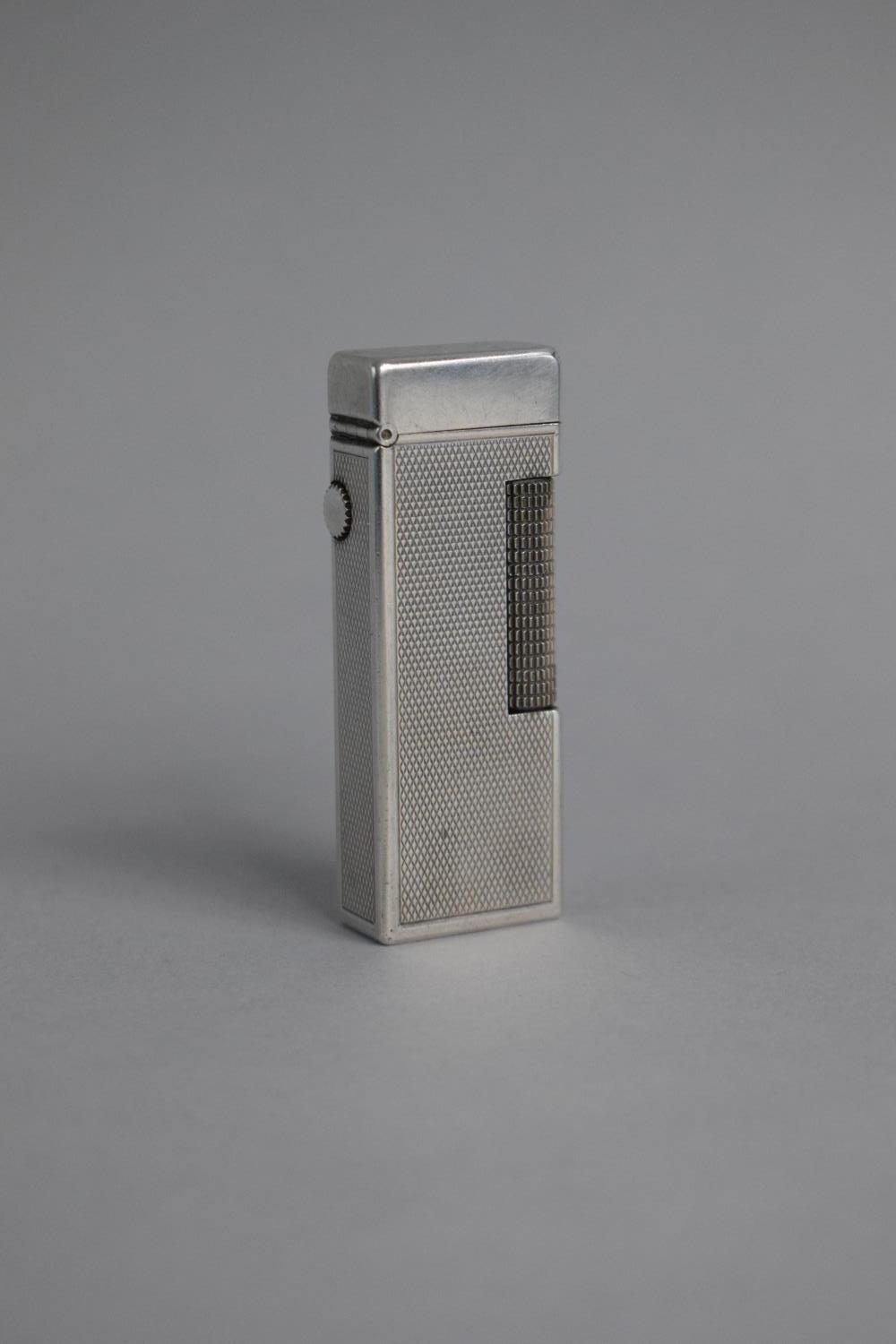 A Vintage Dunhill Silver Plated "Rollagas" Lighter with Engine Turned Decoration (Please Note we are