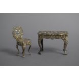 A Miniature Silver Table and Chair with Cherubs Decorated in Relief, Birmingham Hallmarks