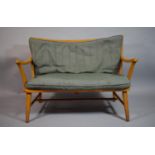An Ercol Style Spindle Back Two Seater Settee