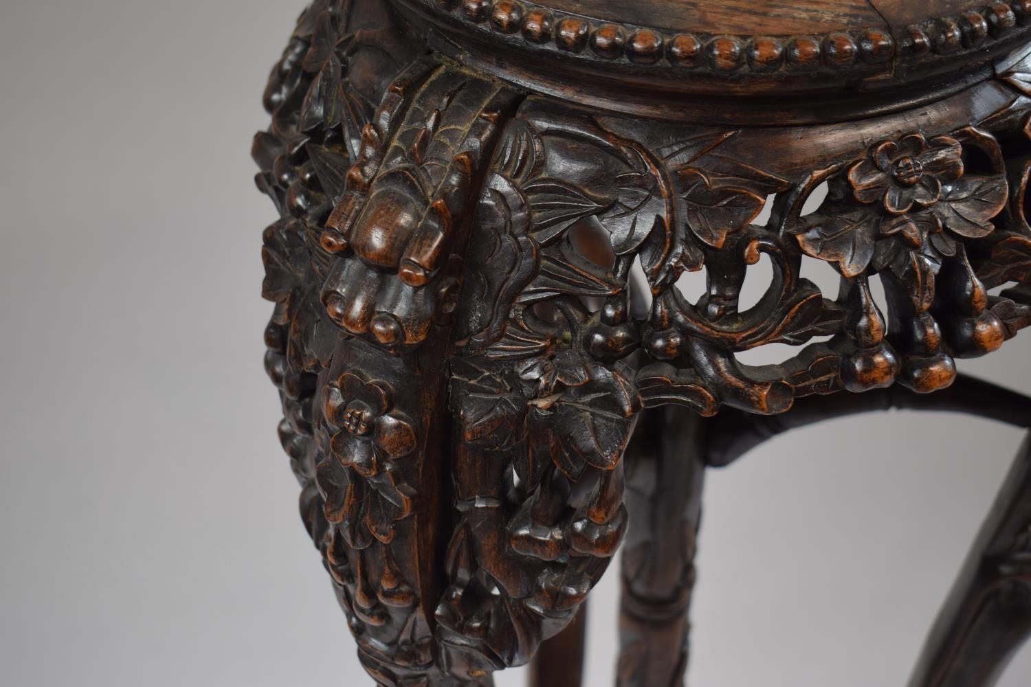 An Intricately Carved and Pierced Tall Oriental Vase Stand with Inset Marble Top, 93cm high - Image 2 of 4