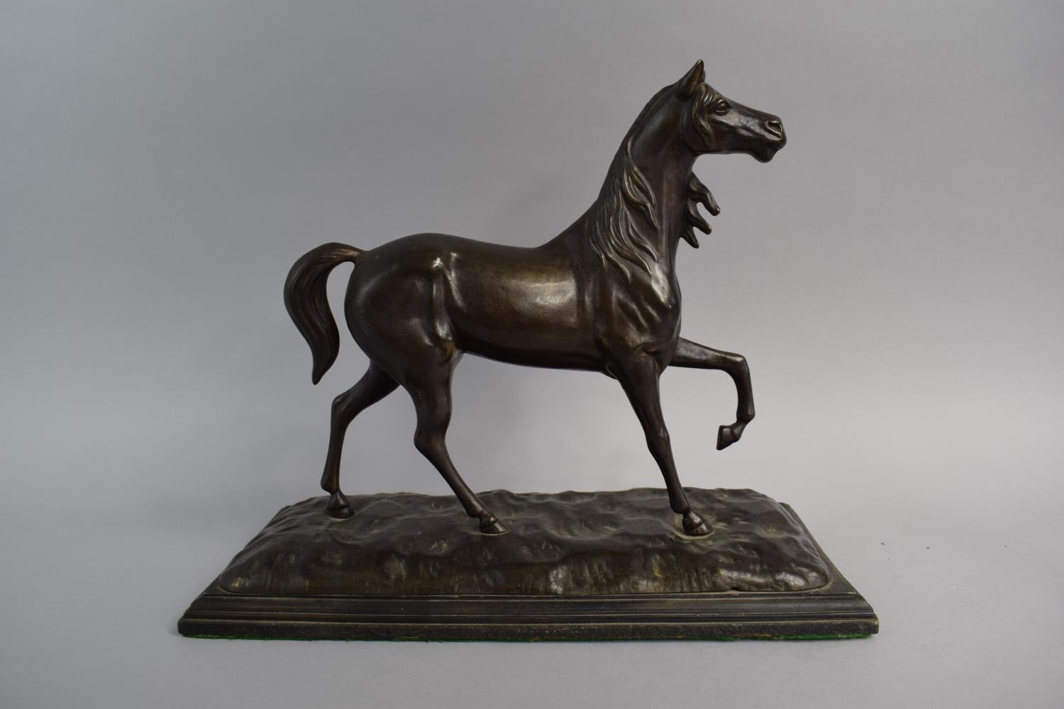 A Reproduction Bronze Effect Horse on Rectangular Wooden Plinth, 37cms Long