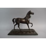 A Reproduction Bronze Effect Horse on Rectangular Wooden Plinth, 37cms Long