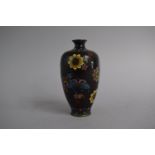 A Small Oriental Cloisonne Vase with Floral Decoration. 11cms High