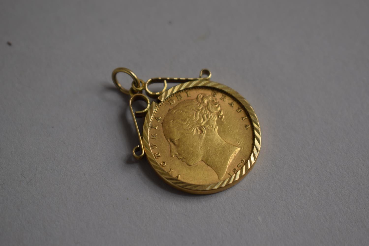 A 9ct Gold Mounted Victorian Sovereign, Young Victoria, 1872