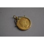 A 9ct Gold Mounted Victorian Sovereign, Young Victoria, 1872
