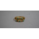 A 1970s 9ct Gold Ring with Jade Stones Mounted on Stylized Crowns. Import Mark for London. 2.7gms