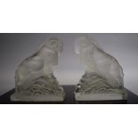 A Pair of Glass Bookends in the Form of Rams, 17cms High (One with Chip to Base)