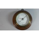 An Edwardian Circular Oak Framed Aneroid Barometer by Negretti & Zambra, No.5366