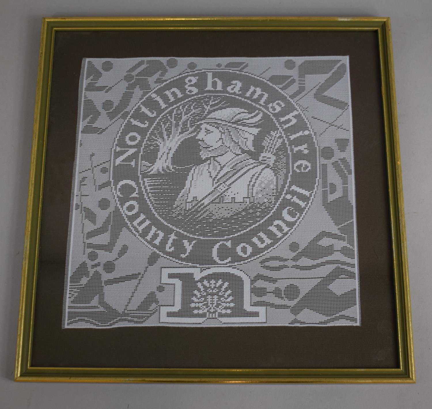 A Framed Contemporary Lace Panel Depicting Robin Hood. "Nottinghamshire County Council", 31cm