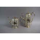 An Elkington and Co Silver Plated Tea Pot and Matching Coffee Pot of Lobed Form with Engraved
