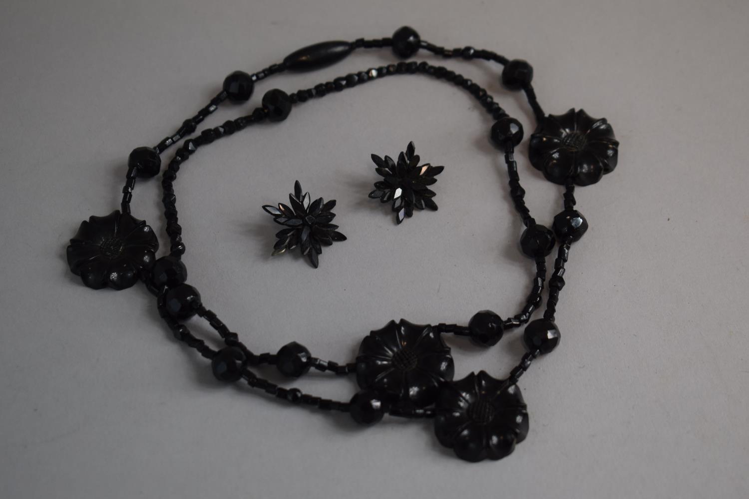 A Victorian Jet Necklace (Restrung) Having Four Floral Beads interspersed amongst Faceted and - Image 2 of 2