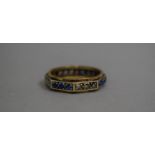An Edwardian Faceted Eternity 9ct Gold Ring Mounted with Blue and White Stones 4.2gms