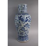 A Large Oriental Blue and White Vase Decorated with Birds, Insects and Flowers, Hairline crack to