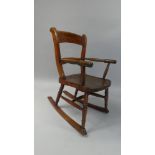 A 19th Century Child's Rocking Chair Made from Beechwood with an Elm Seat, 68cm high