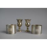 A Pair of Miniature Silver Goblets, 5.75cm High Together with a Pair of Silver Napkin Rings