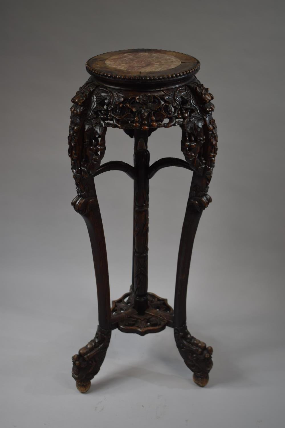 An Intricately Carved and Pierced Tall Oriental Vase Stand with Inset Marble Top, 93cm high