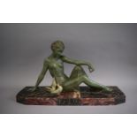 A French Art Deco Green Patinated Spelter Figure of Reclining Maiden with Pair of Doves on Coloured