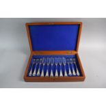 A Mahogany Cased Set of Six Walker and Hall Fish Knives and Forks