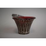 A Silver Filigree Basket with Loop Carrying Handle Having Ruby Glass Liner. Chip to Rim and
