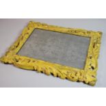 An Early 18th Century Wall Mirror with Carved Stylized Acanthus Leaf Frame and Original Painted