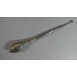 A Silver Mounted Button Hook. Chester 1905. 24cms Long