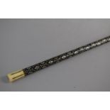 A 19th Century Ebonised Long Walking Cane with Inlaid Mother of Pearl Floral Decoration and Ivory