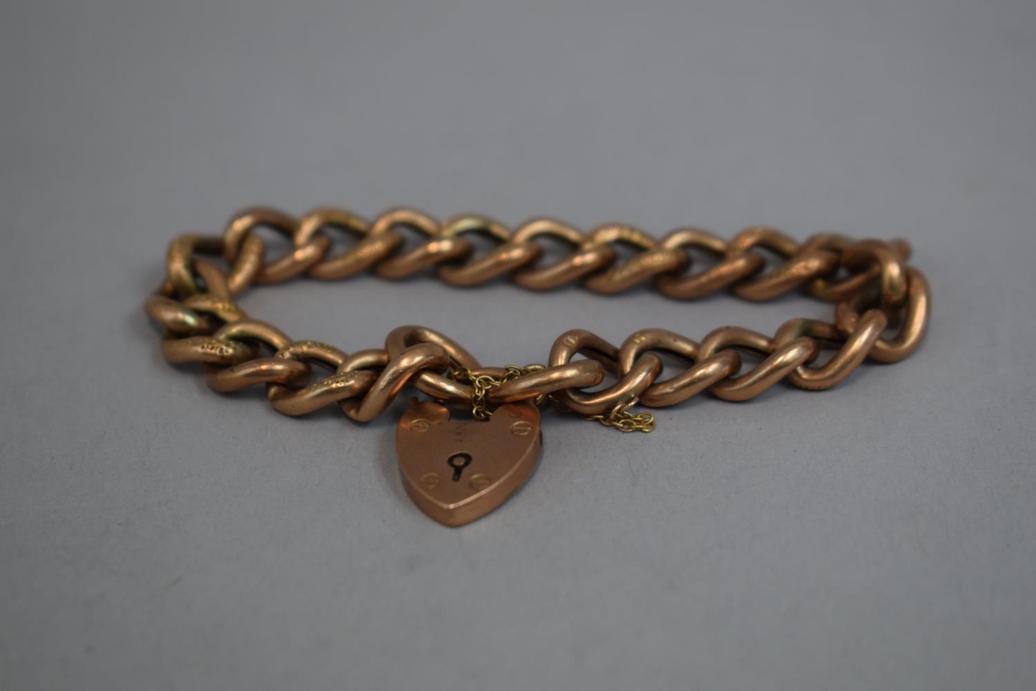 A 9ct Rose Gold Charm Bracelet. (Hollow) 15.8gms.