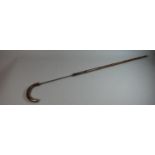 A Silver Mounted Swordstick. 83cms Long