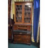 A Mahogany Secretaire Bookcase with Fitted Drawer. Having Glazed Top Four Shelf Book Case and