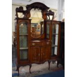 An Edwardian Inlaid Mahogany Chiffonier with Central Serpentine Breakfront Having Centre Drawer