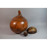 A Collection of Three South American Carved Gourds, The Largest 38cm high