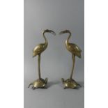 A Pair of Oriental Brass Stork on Turtle Ornaments, 26.5cms High