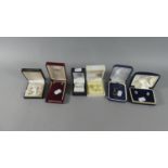 A Collection of Five Pairs of Silver Mounted Earrings and a Silver and Amber Pendant
