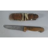 A Vintage Hunting Knife in Leather and Rope Scabbard