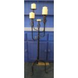 A Five Branch Wrought Iron Candle Pricket Stand with Barley Twist Support and Tripod Base, 120cm