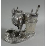 A Victorian Silver PLated Novelty Cruet in the Form of a Standing Camel with Etched Glass Saddle Bag