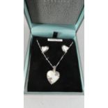 A Silver Mounted Mother of Pearl Suite Comprising Heart Shaped Pendant and Matching Stud Earrings